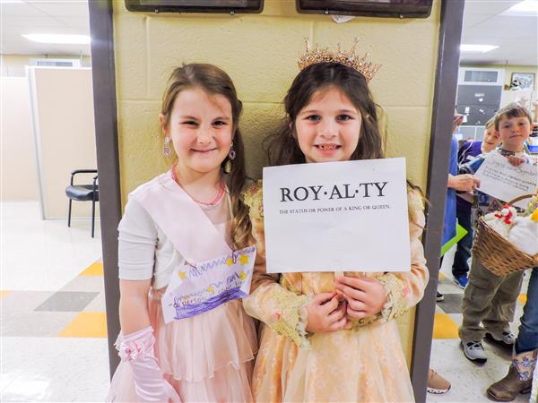 Students and teachers dressing up for a vocabulary parade. 